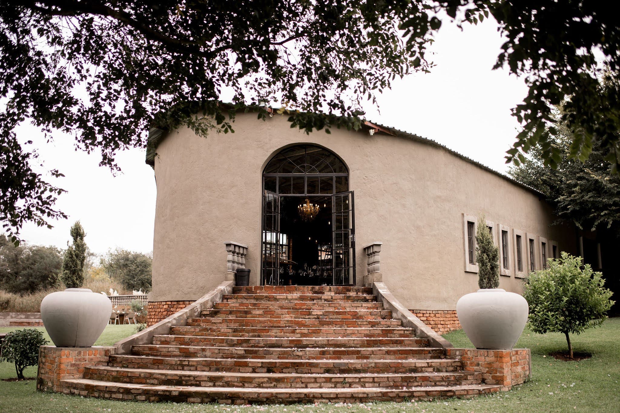 Bride against chapel window