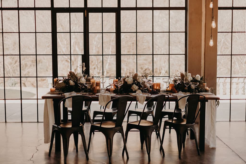 Bride against chapel window